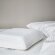 MJOLKKLOCKA Ергономічна подушка для сну на боці/спині 41х51 см